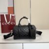 GG Emblem Small Duffle Bag 855789