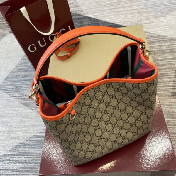 GG Emblem Small Bucket Bag 815103-1